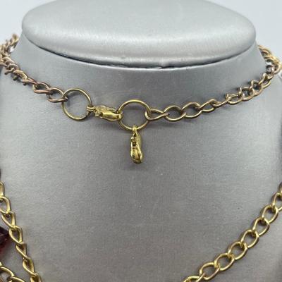LOT 67: Amber and Goldtone Necklaces