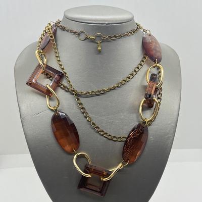 LOT 67: Amber and Goldtone Necklaces
