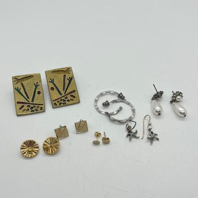 LOT 69: Pierced Earring Collection