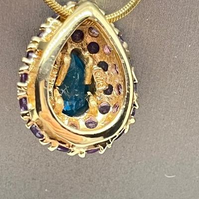 LOT 80: 14K Yellow Gold Amethyst and Blue Topaz Pendant on 20" Chain