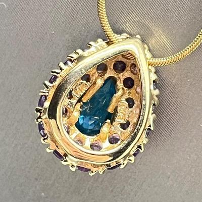 LOT 80: 14K Yellow Gold Amethyst and Blue Topaz Pendant on 20" Chain