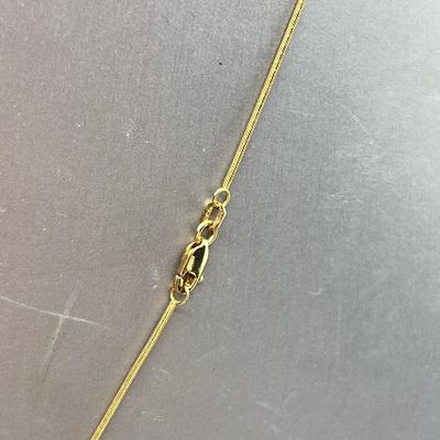 LOT 80: 14K Yellow Gold Amethyst and Blue Topaz Pendant on 20" Chain