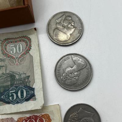 LOT 103: Collection of International Currency and New In Box Louis Vuitton Key Holder Wallet