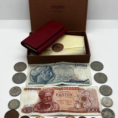 LOT 103: Collection of International Currency and New In Box Louis Vuitton Key Holder Wallet