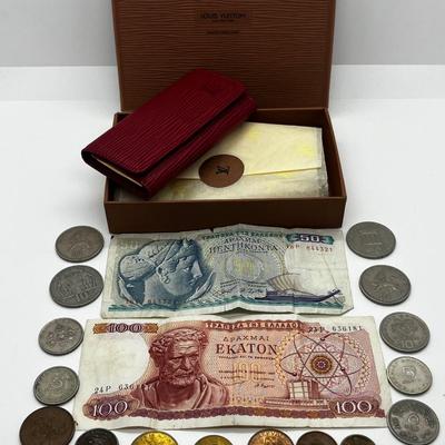 LOT 103: Collection of International Currency and New In Box Louis Vuitton Key Holder Wallet