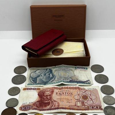 LOT 103: Collection of International Currency and New In Box Louis Vuitton Key Holder Wallet