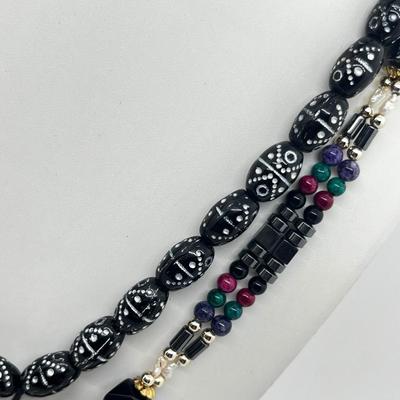 LOT 117: Black Tone Necklaces and Pierced Earrings