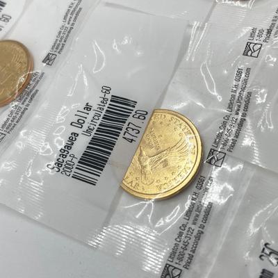 LOT 126: Four Uncirculated Sacagawea Coins and Uncirculated State Quarters