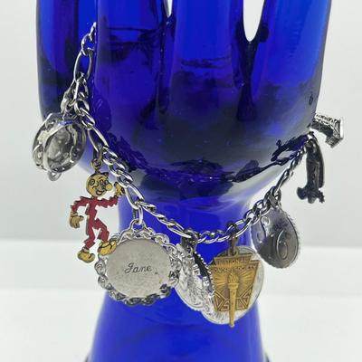 LOT 127: Vintage Sterling Charm Bracelet With Some Sterling Charms