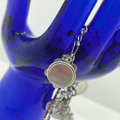 LOT 127: Vintage Sterling Charm Bracelet With Some Sterling Charms