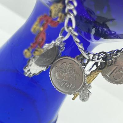 LOT 127: Vintage Sterling Charm Bracelet With Some Sterling Charms