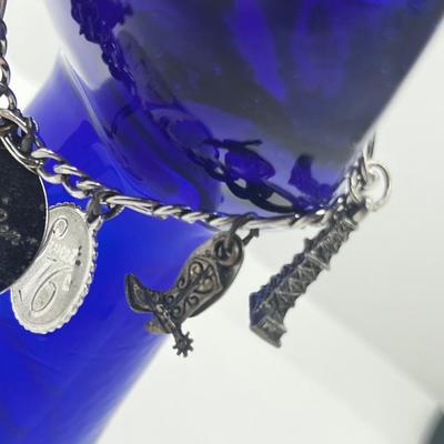 LOT 127: Vintage Sterling Charm Bracelet With Some Sterling Charms