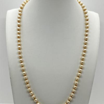 LOT 128: Cultured Set of Pearls With Silver Clasp - 16"