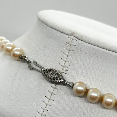 LOT 128: Cultured Set of Pearls With Silver Clasp - 16"