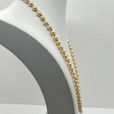 LOT 128: Cultured Set of Pearls With Silver Clasp - 16"