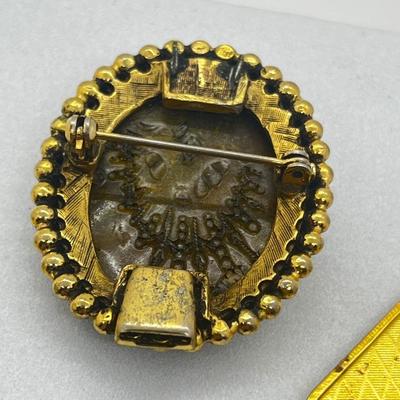 LOT 131: Two Damascene Square Brooches/Pins With Trombone Clasps, Cameo Brooch/Pin, and "Blue He" Shoe Clips