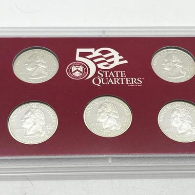 LOT 133: United States Mint State Quarters Silver Proof Set