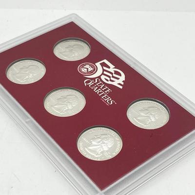 LOT 133: United States Mint State Quarters Silver Proof Set