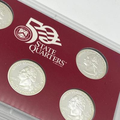 LOT 133: United States Mint State Quarters Silver Proof Set