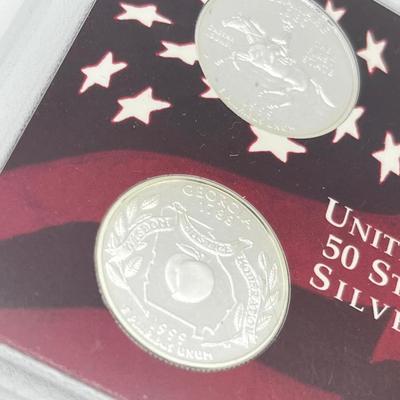 LOT 133: United States Mint State Quarters Silver Proof Set