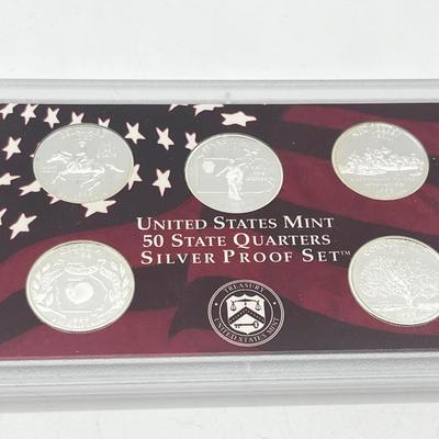 LOT 133: United States Mint State Quarters Silver Proof Set