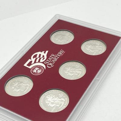 LOT 133: United States Mint State Quarters Silver Proof Set