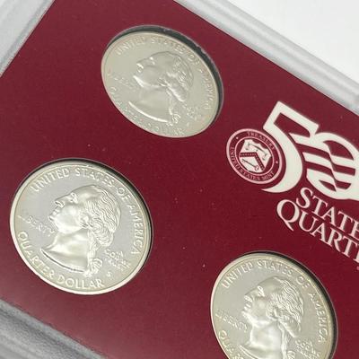 LOT 133: United States Mint State Quarters Silver Proof Set