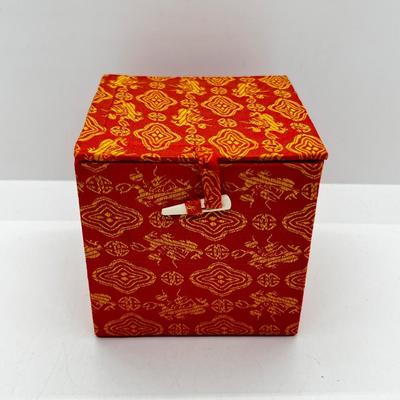 LOT 142: Collection of Unique Bracelets With Cool Fabric Box