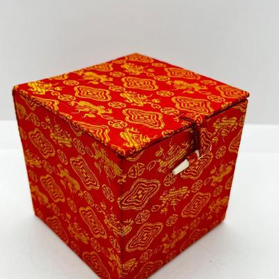LOT 142: Collection of Unique Bracelets With Cool Fabric Box