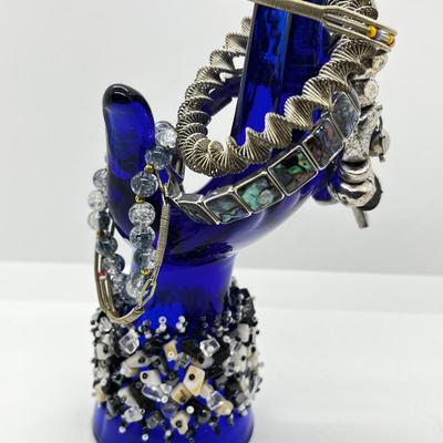 LOT 142: Collection of Unique Bracelets With Cool Fabric Box
