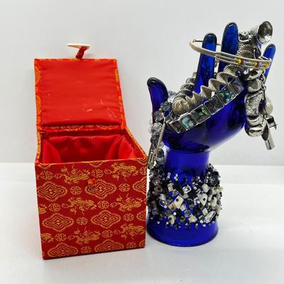 LOT 142: Collection of Unique Bracelets With Cool Fabric Box