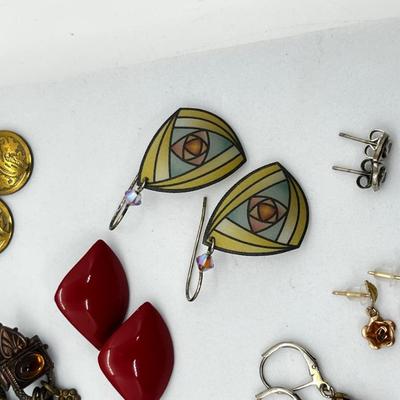 LOT 144: Unique Pierced Earring Collection