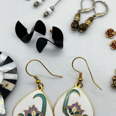 LOT 144: Unique Pierced Earring Collection