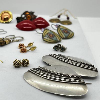 LOT 144: Unique Pierced Earring Collection