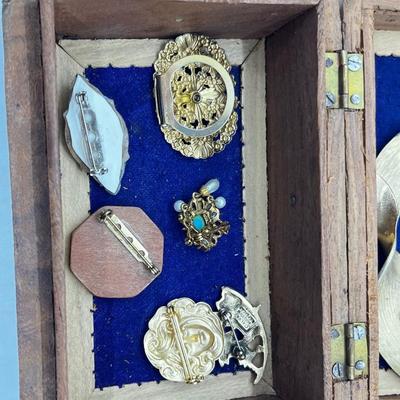 LOT 145: Artisan Brooch/Pin Collection With Unique Carved Wooden Box