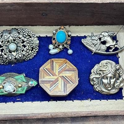 LOT 145: Artisan Brooch/Pin Collection With Unique Carved Wooden Box