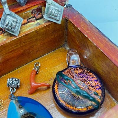 LOT 146: Three Art Glass Pendants, Tiny Jade Pendant, Branch Coral Pendant, Cinnabar Round Pendant and More!