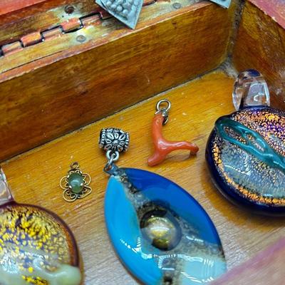 LOT 146: Three Art Glass Pendants, Tiny Jade Pendant, Branch Coral Pendant, Cinnabar Round Pendant and More!