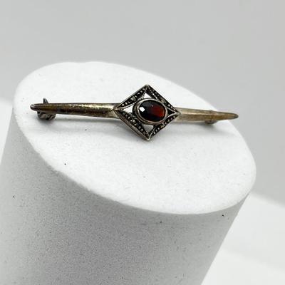 LOT 154: Vintage Signed Sterling Silver Garnet and Marcasite Bar Brooch - 2.4 GTW