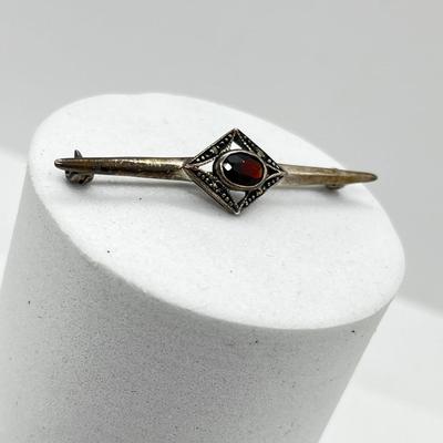 LOT 154: Vintage Signed Sterling Silver Garnet and Marcasite Bar Brooch - 2.4 GTW