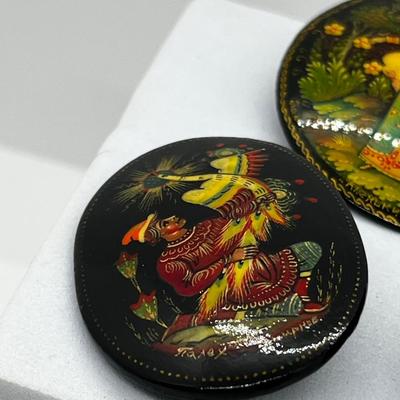 LOT 160: Russian Hand Painted Black Lacquer Brooches and Swan Trinket Box
