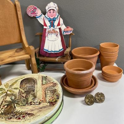 Terra cotta flower pots, tin and wood furniture