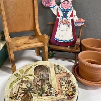 Terra cotta flower pots, tin and wood furniture