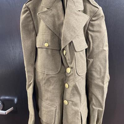 Dark green military jacket and hat