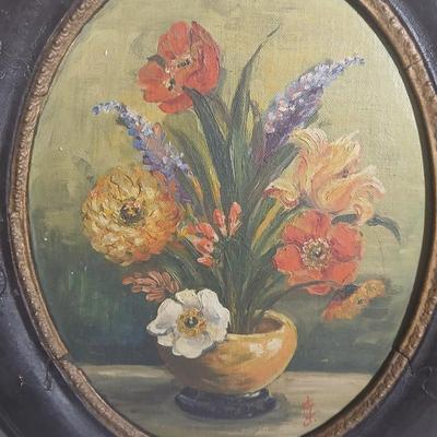 Two matching Antique original paintings in antique oval frames
