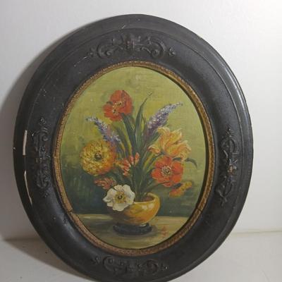 Two matching Antique original paintings in antique oval frames