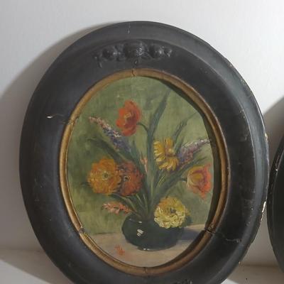 Two matching Antique original paintings in antique oval frames