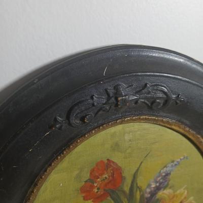 Two matching Antique original paintings in antique oval frames