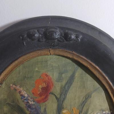 Two matching Antique original paintings in antique oval frames