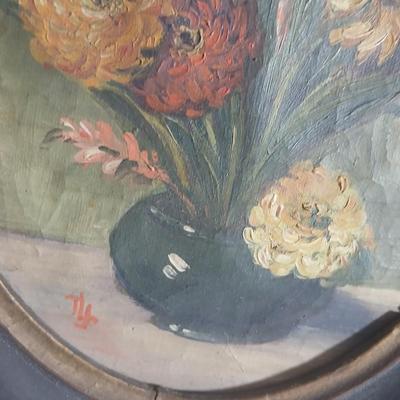 Two matching Antique original paintings in antique oval frames